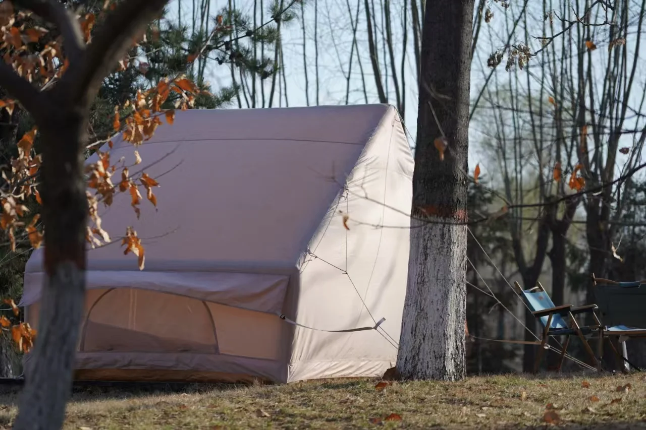 Compact LT-6.3 inflatable cabin tent set up on a platform