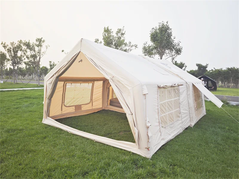Beige modular inflatable tent with a connected extension and open front