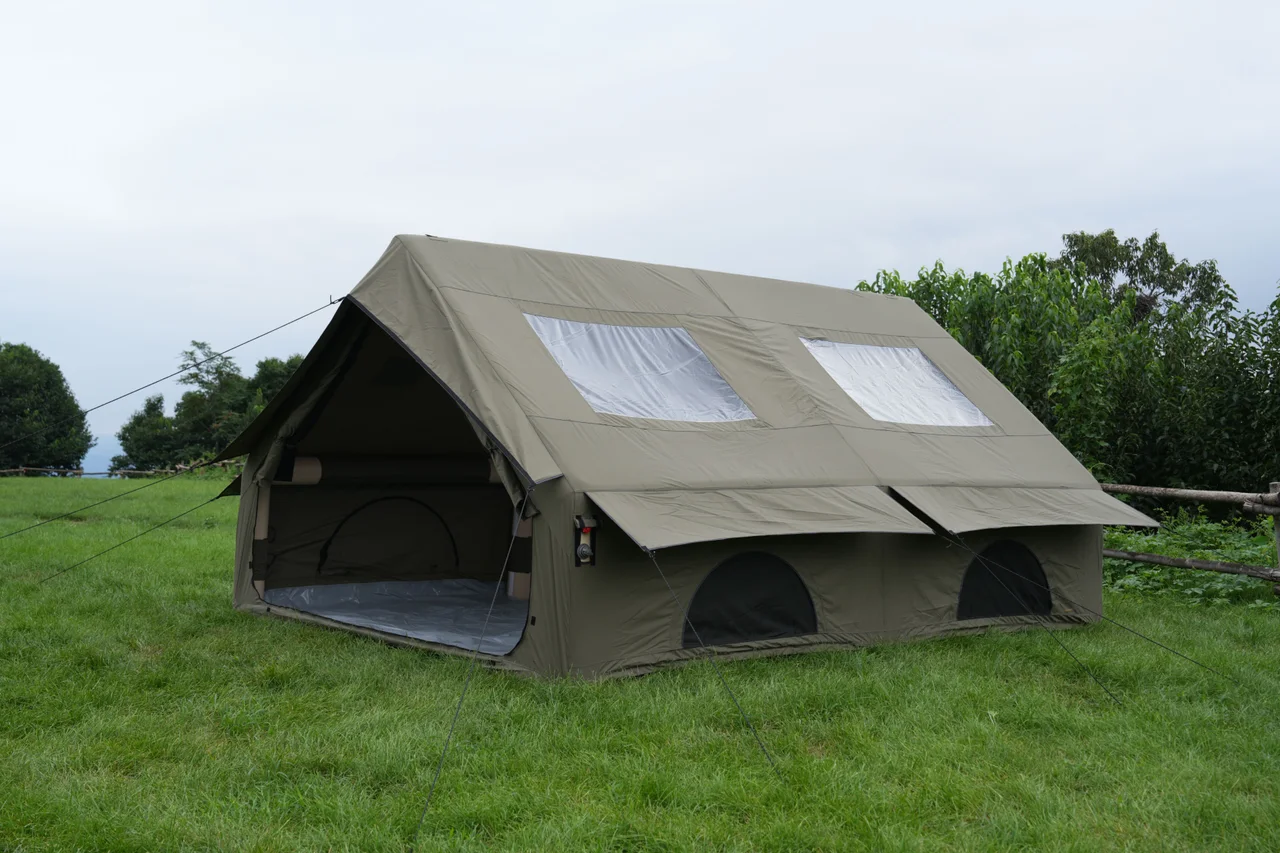 Olive 12 square metre inflatable lodge with roof-light panels and low windows