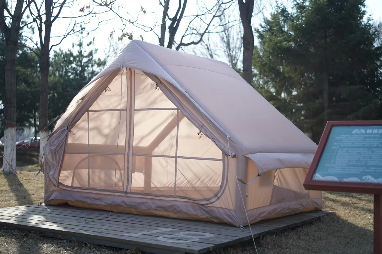 Compact LT-6.3 inflatable tent viewed from the front on a raised platform