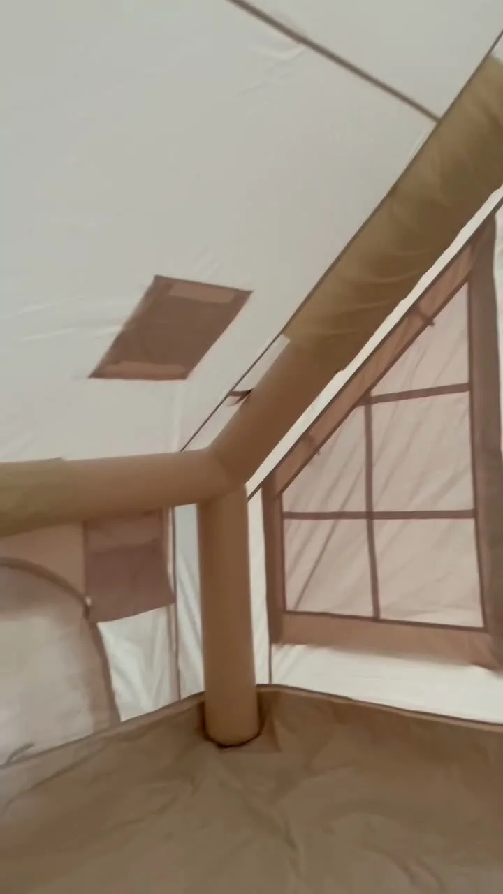 Compact inflatable tent interior showing an air column, windows and roof opening