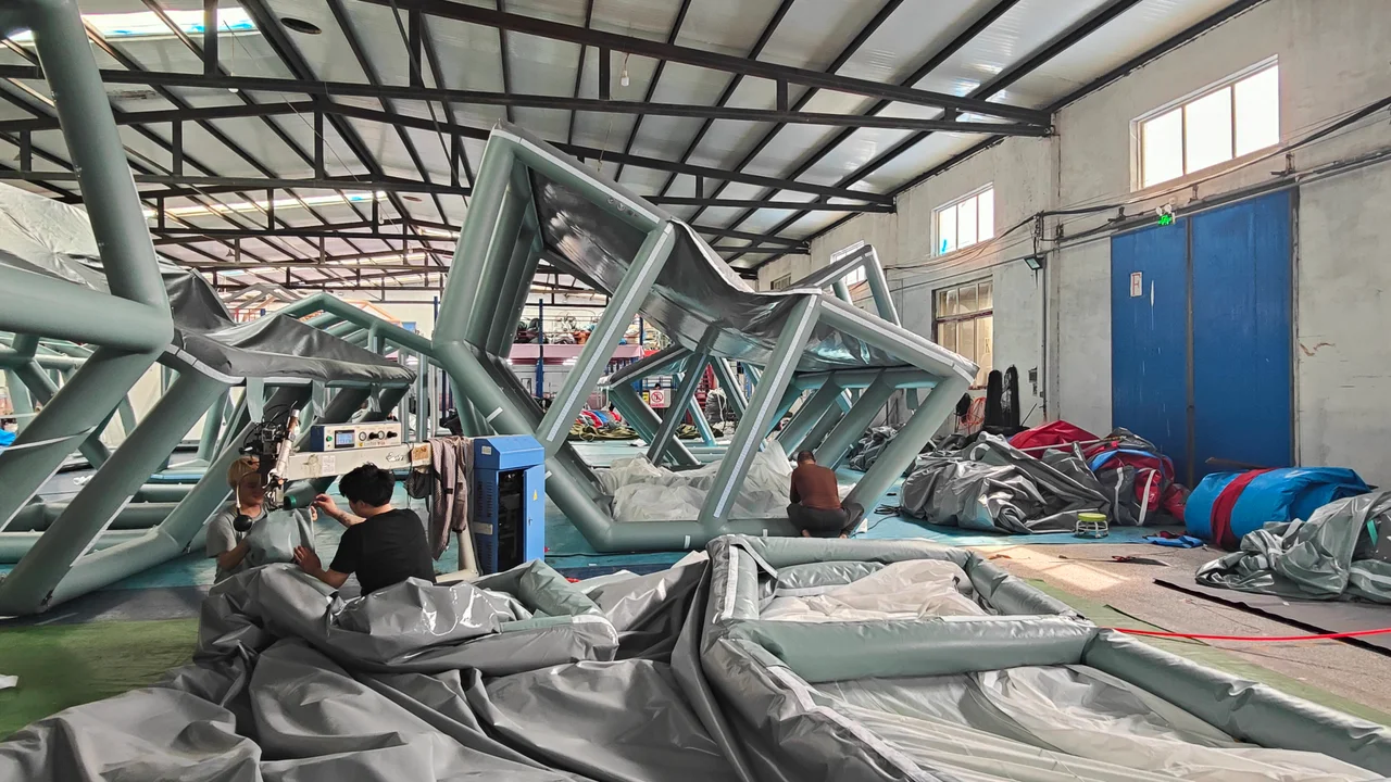 Assembled inflatable tent air-beam frames inside the workshop