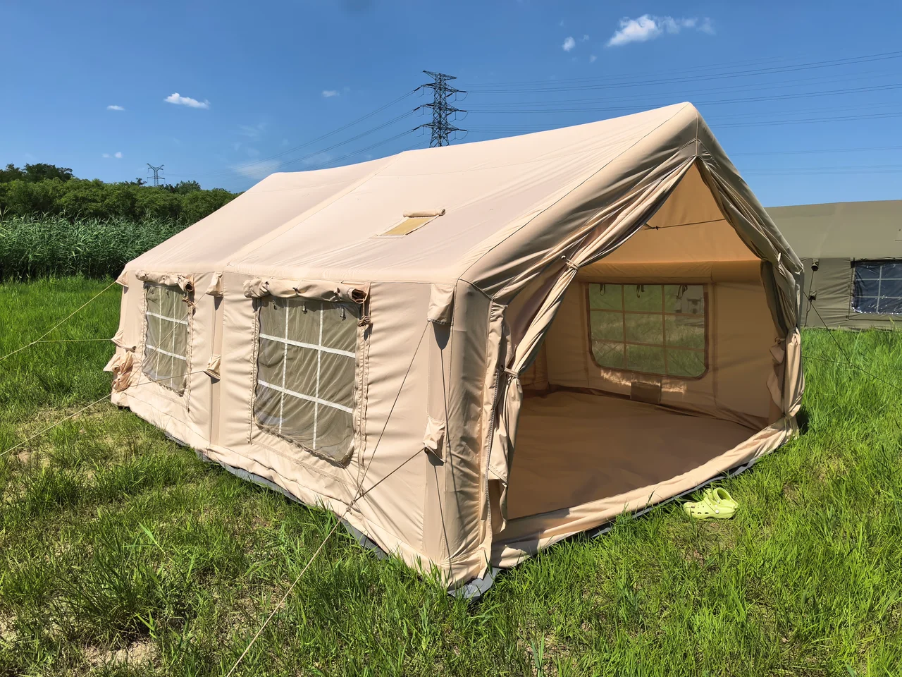 LT-18.16 inflatable camping tent shown from the front corner with the entrance open