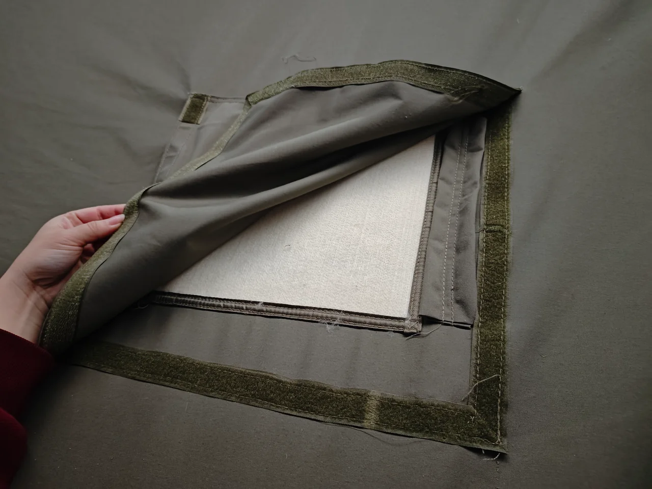 Close view of an LT-18.16 tent window, mesh and cover construction
