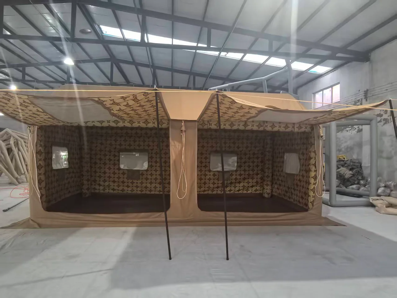 Eighteen square metre inflatable Majlis tent with its front canopy and entrance open