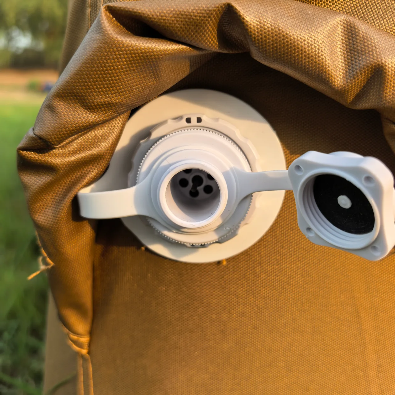 Close view of the inflation valve on an LT-07 inflatable camping tent sample