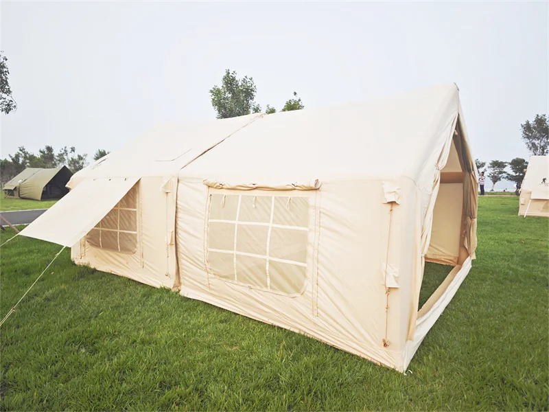 Side profile of a modular inflatable tent with its connected extension